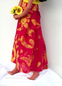 Art muse by Marina. Side view detail of batik Sarong and Teha'mana's feet.