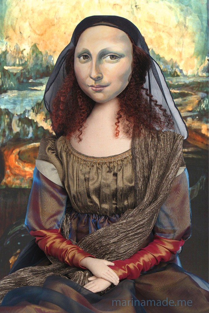 Mona Lisa with batik "Leonardo style" Italian landscape, by Marina Elphick. Mona Lisa muse sculpted in textiles by Marina Elphick. La Gioconda, La Joconde, Lisa Gherardini, or as we all know her, Mona Lisa.