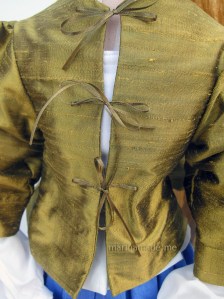 Front Jacket detail, girl with Pearl Earring muse. Marina creates soft sculpted muses of the women in popular artists' lives and gives us an alternative narrative to their story.