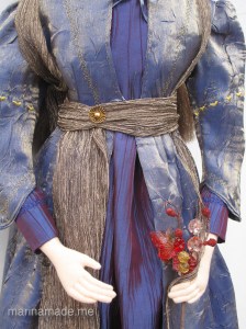Detail of Georgiana's dress and tunic on muse by Marina Elphick.Georgiana Burne-Jones muse designed, sculpted, modelled and painted by Marina ElphickGeorgiana Burne-Jones muse designed, sculpted, modelled and painted by Marina Elphick. Marina's muses at marinamade.me